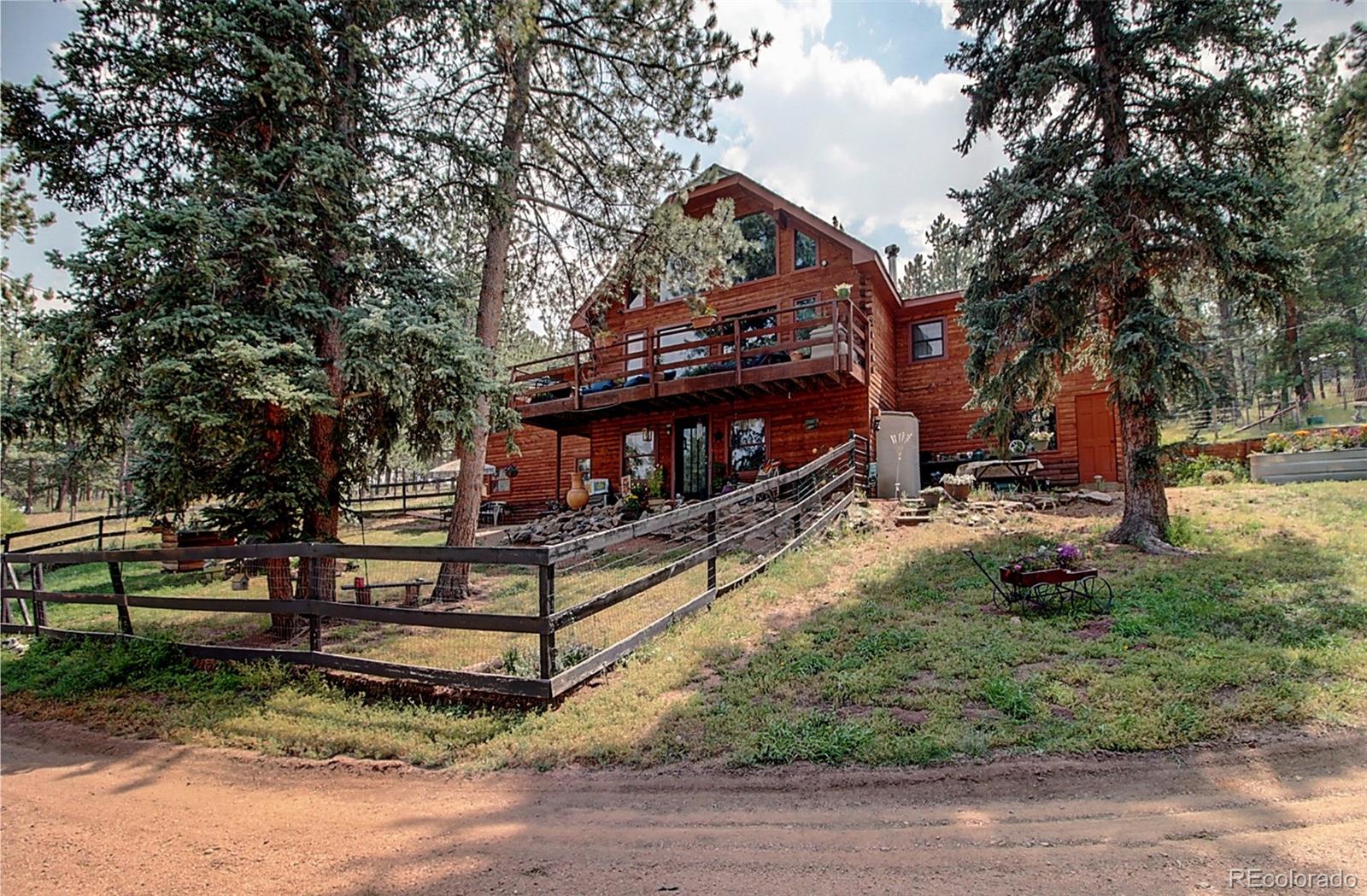 135 Nova Drive Pine, CO 80470 - Photo 2 of 38 a view of a park with large trees
