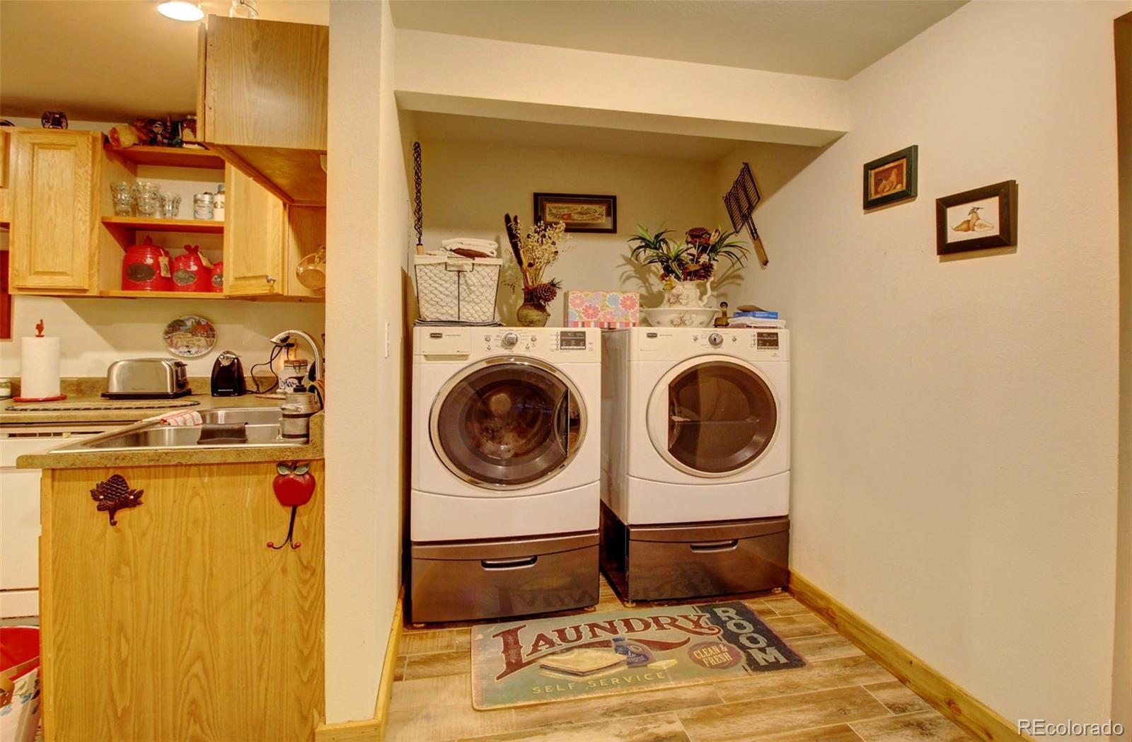 135 Nova Drive Pine, CO 80470 - Photo 31 of 38 a bedroom with a bed and cabinets