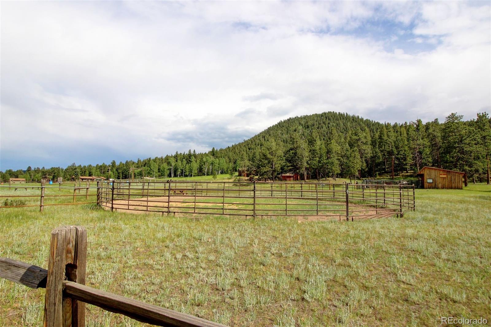 135 Nova Drive Pine, CO 80470 - Photo 37 of 38 a view of lake with a city