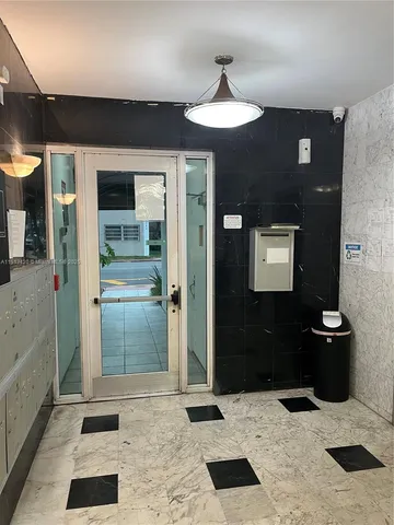 a bathroom with a sink and a shower