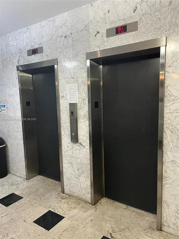 a bathroom with a sink and a shower