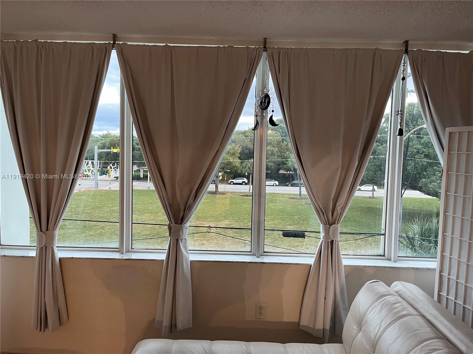 8233 Harding Avenue, Unit 305 Miami Beach, FL 33141 - Photo 24 of 46 a view of a balcony with a bed