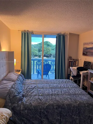 a room with furniture and a window