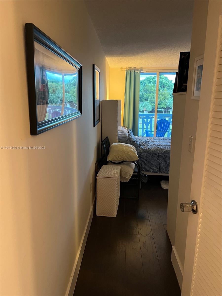 8233 Harding Avenue, Unit 305 Miami Beach, FL 33141 - Photo 28 of 46 a room with furniture and a window