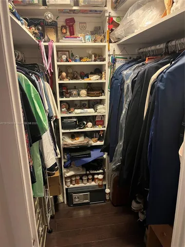 a view of balcony with wooden floor and outdoor seating