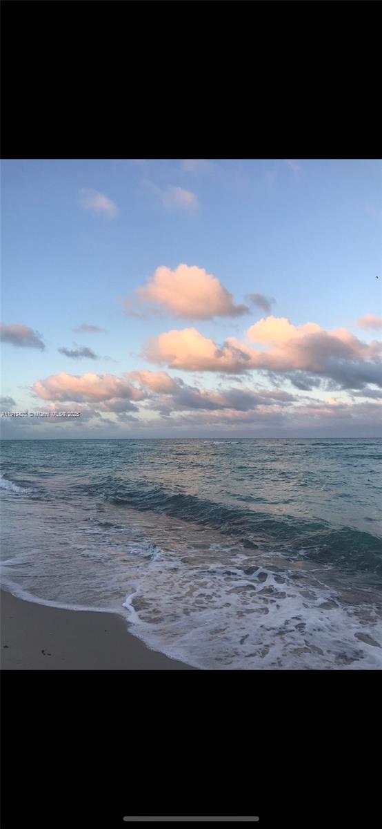 8233 Harding Avenue, Unit 305 Miami Beach, FL 33141 - Photo 43 of 46 a view of beach and ocean