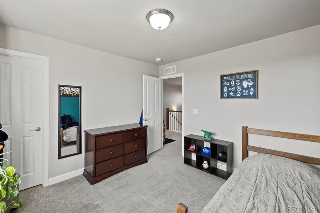 a view of livingroom with furniture and toys