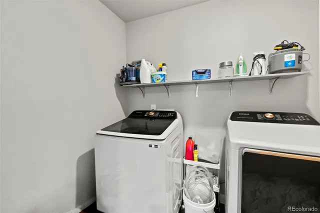 a utility room with dryer and washer