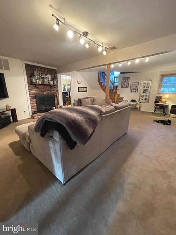 a room with gym equipment and a large window