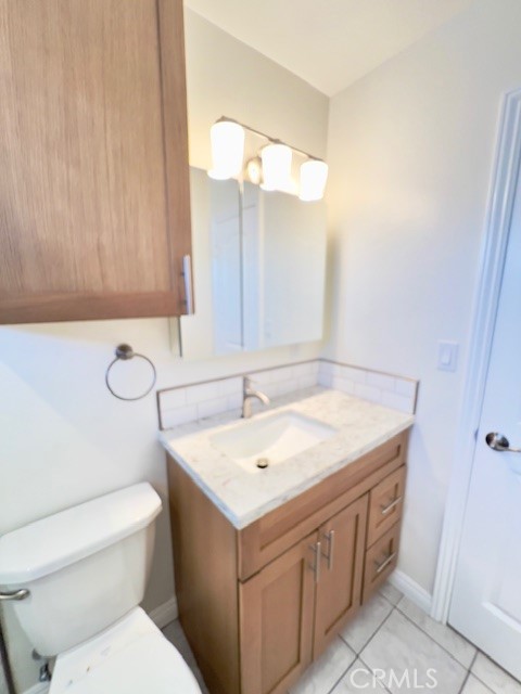 711 North Soldano Avenue, Unit 6 Azusa, CA 91702 - Photo 32 of 41 a bathroom with a sink and a toilet