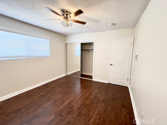 711 North Soldano Avenue, Unit 6 Azusa, CA 91702 - Photo 41 of 41 an empty room with wooden floor and ceiling fan