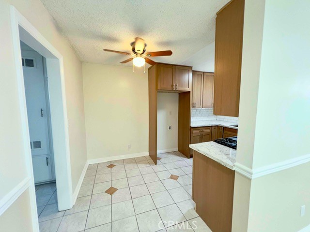 711 North Soldano Avenue, Unit 6 Azusa, CA 91702 - Photo 8 of 41 a view of a kitchen cabinets