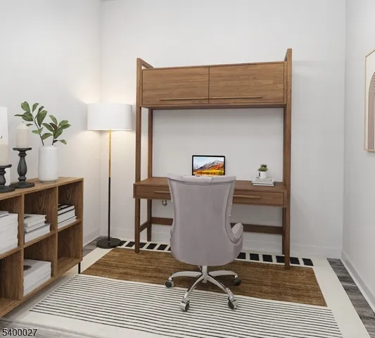 a room with a table and a potted plant