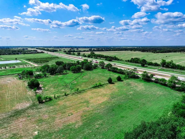 a view of a lush green field