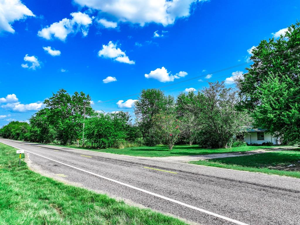 7801 West Interstate Highway Cumby, TX 75433 - Photo 25 of 32 a view of a green yard