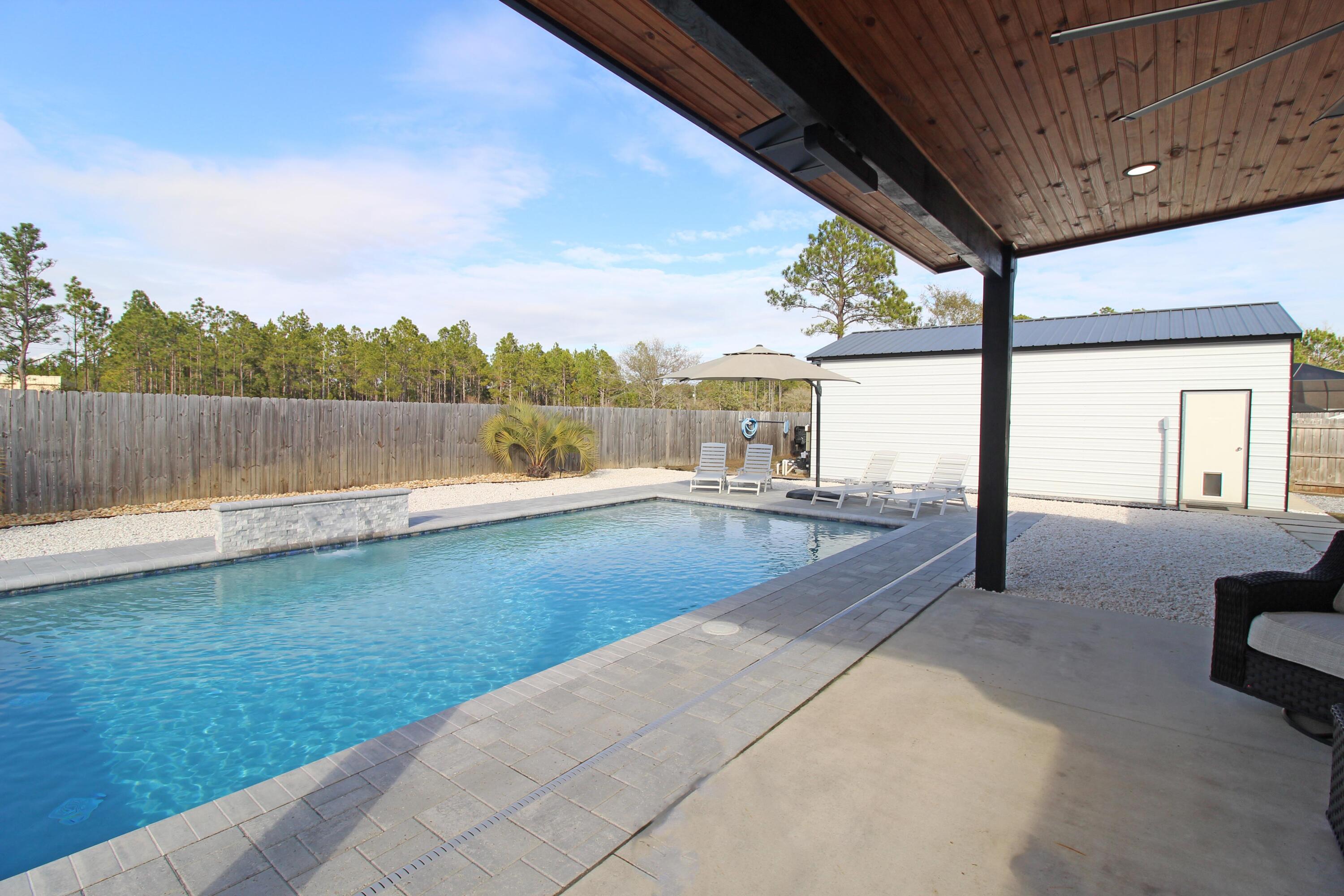 64 Indian Cove Freeport, FL 32439 - Photo 84 of 87 a view of swimming pool with lake and mountain view