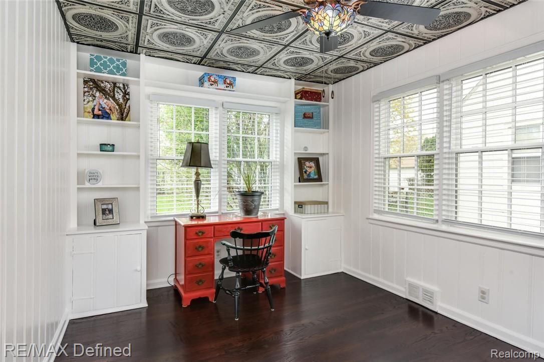 1705 Eaton Road Berkley, MI 48072 - Photo 5 of 22 Beautiful custom ceiling and built-in bookshelves creating the perfect space to work or relax.