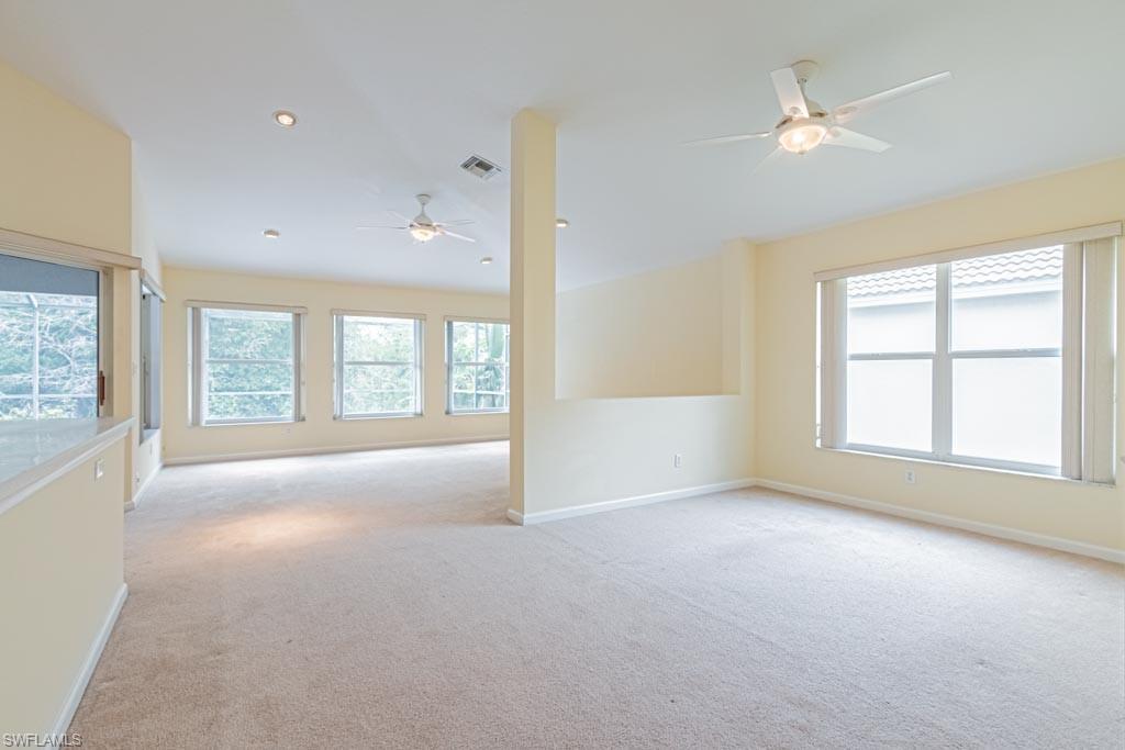 7101 Timberland Circle Naples, FL 34109 - Photo 14 of 50 a view of an empty room with a window