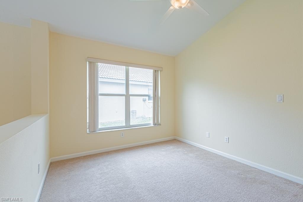 7101 Timberland Circle Naples, FL 34109 - Photo 16 of 50 an empty room with a window