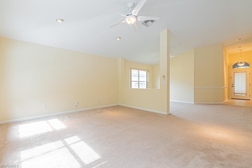 7101 Timberland Circle Naples, FL 34109 - Photo 18 of 50 a view of an empty room with a window