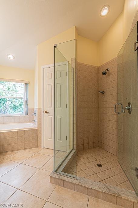 7101 Timberland Circle Naples, FL 34109 - Photo 24 of 50 a bathroom with a shower