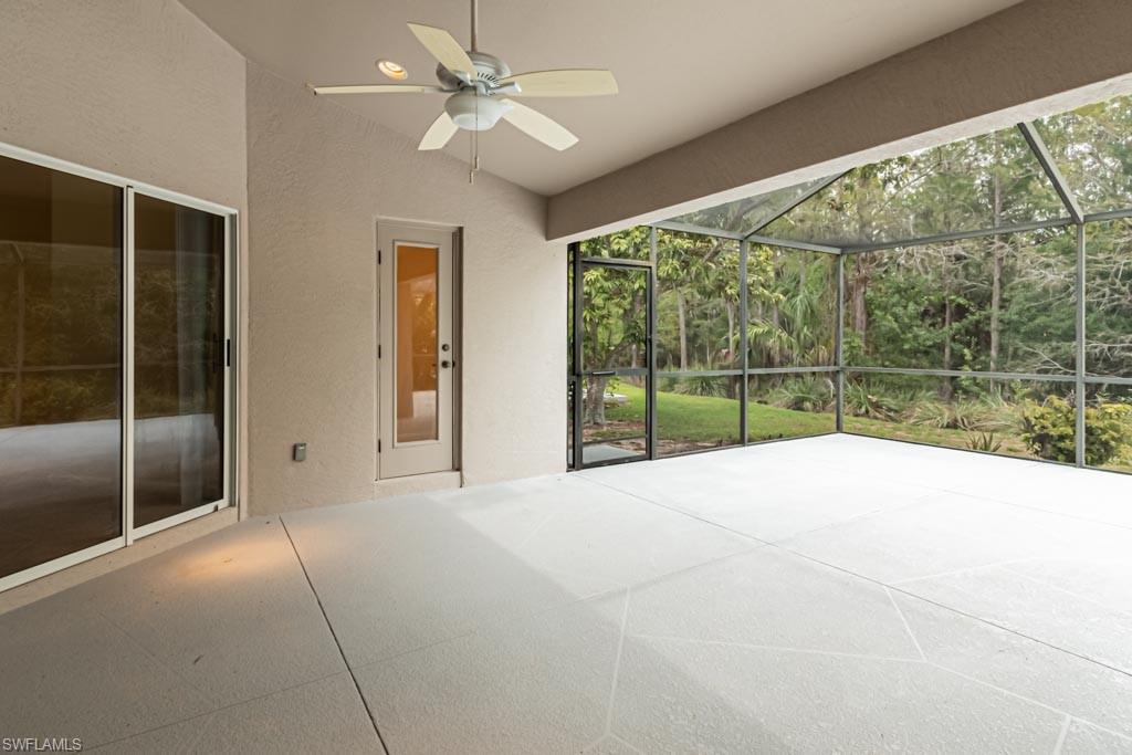 7101 Timberland Circle Naples, FL 34109 - Photo 39 of 50 a view of an empty room with a balcony