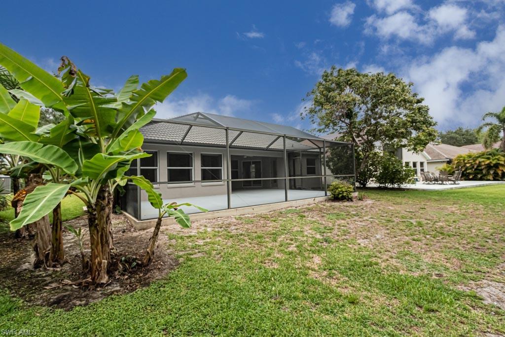 7101 Timberland Circle Naples, FL 34109 - Photo 50 of 50 a house view with a garden space