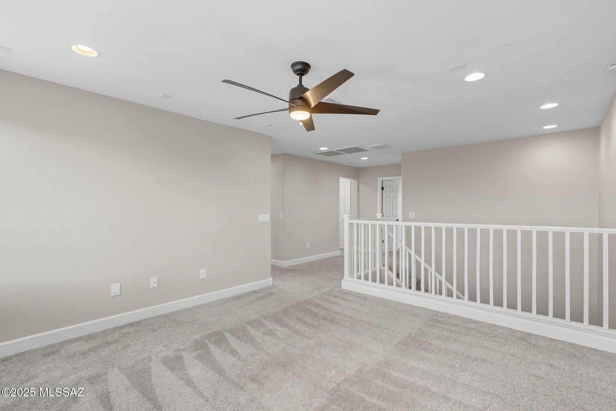 12100 East Ryscott Circle Vail, AZ 85641 - Photo 23 of 53 a view of a livingroom with a ceiling fan
