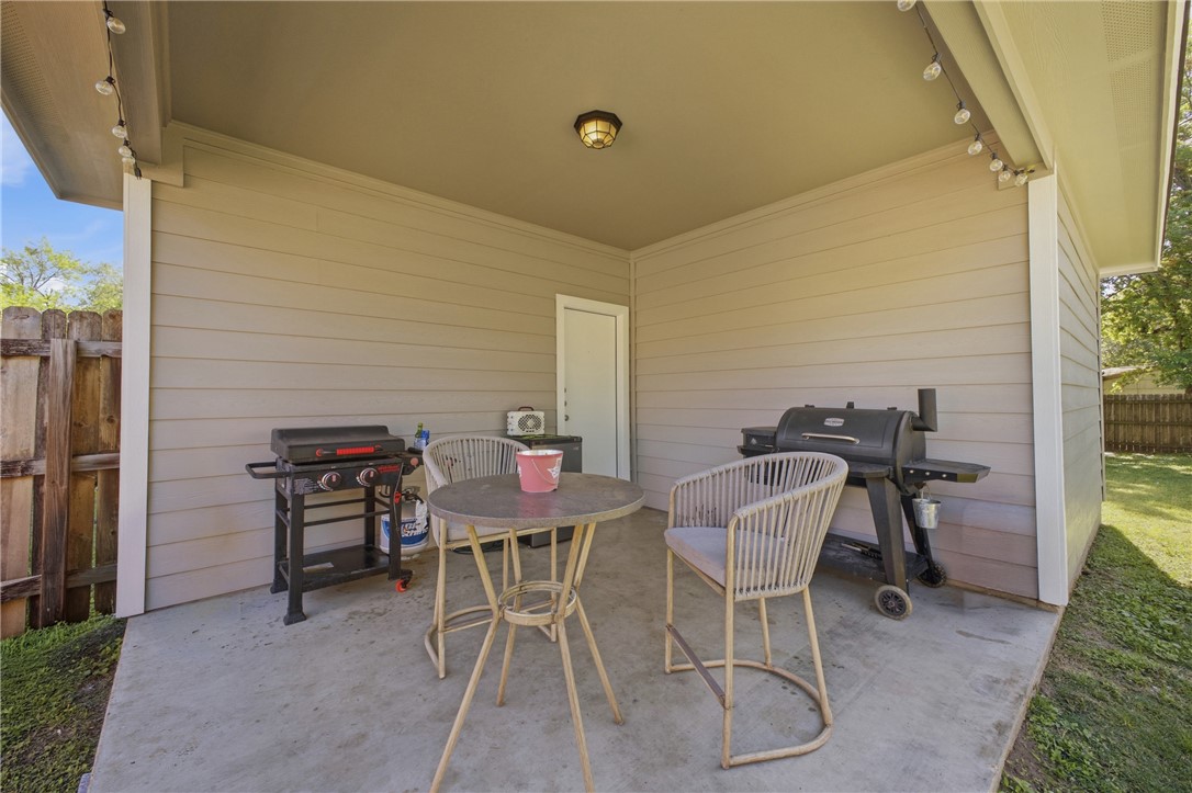 4400 Milam Street Bryan, TX 77801 - Photo 22 of 25 a view of a patio with table and chairs and potted plants