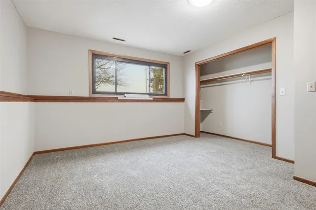 a bathroom with a shower and a sink