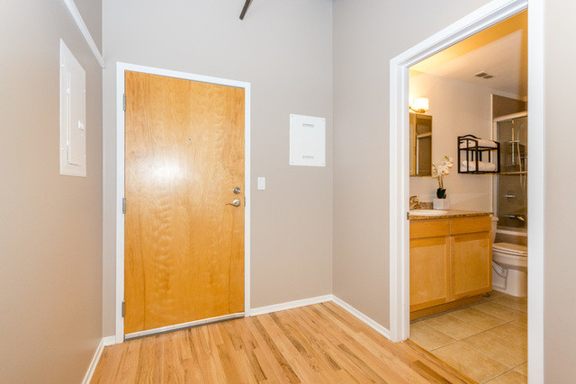 1500 West Monroe Street, Unit 715 Chicago, IL 60607 - Photo 15 of 26 a view of a bedroom from a hallway