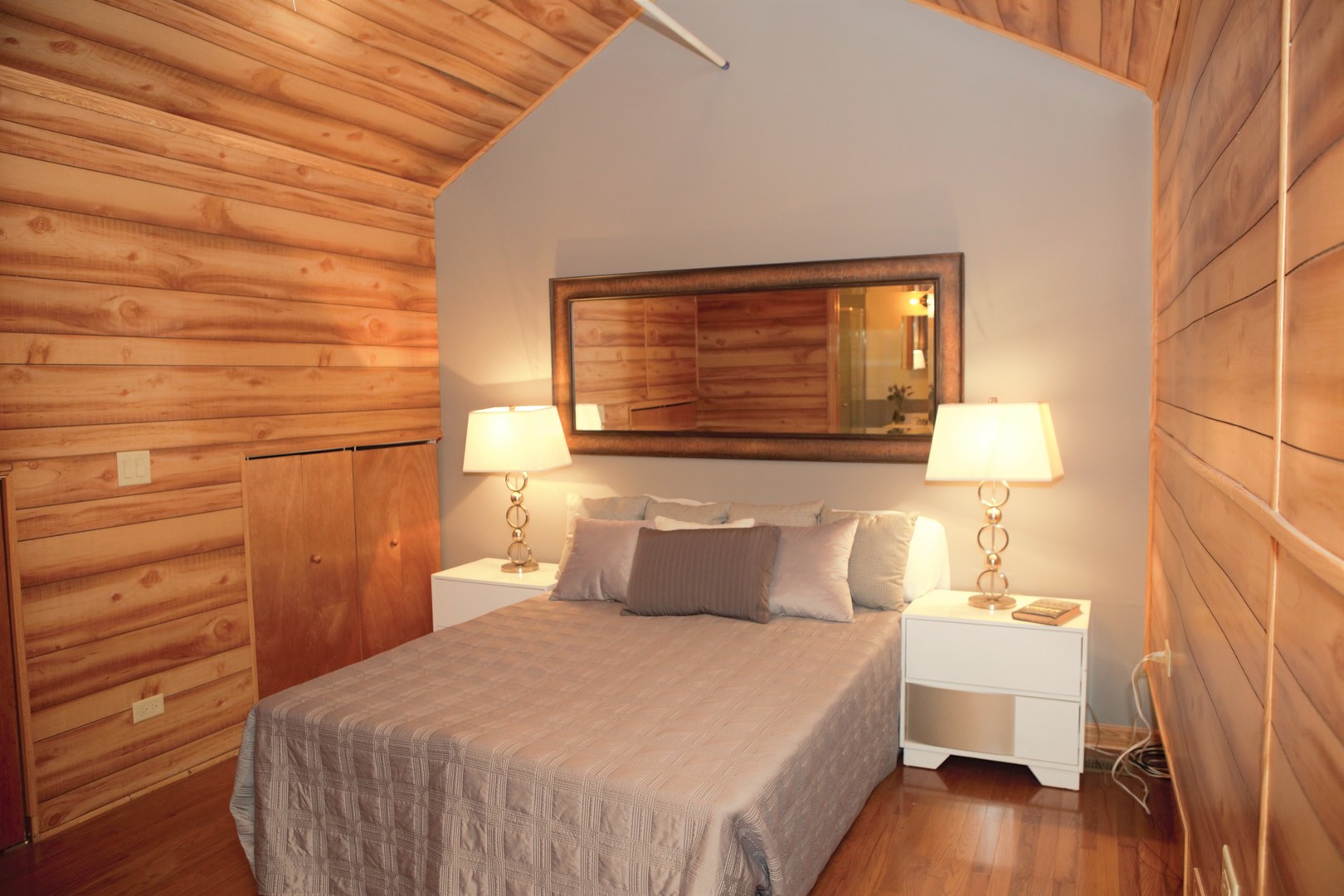 1500 West Monroe Street, Unit 715 Chicago, IL 60607 - Photo 18 of 26 a bedroom with a bed and a table
