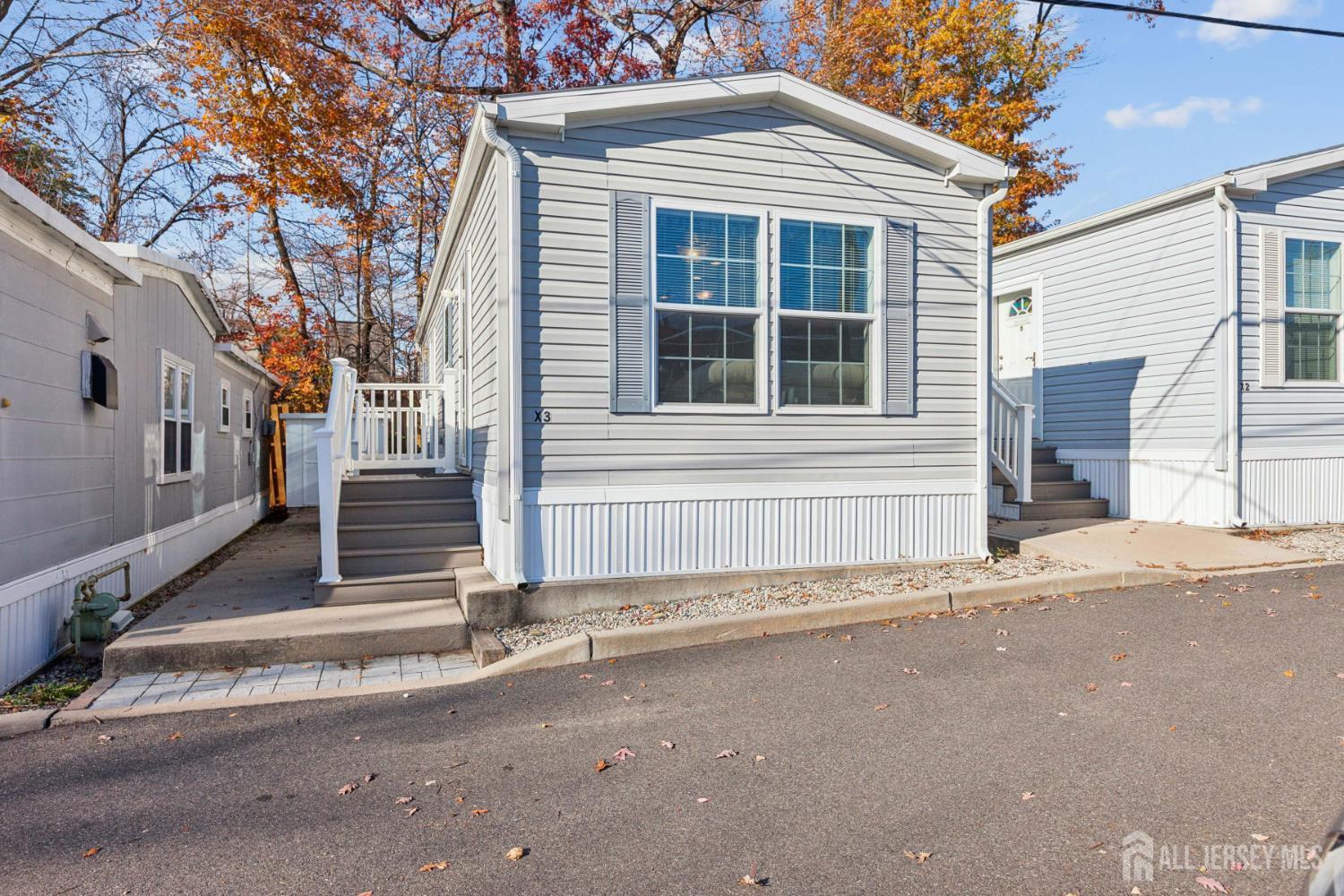 a front view of a house with a garage