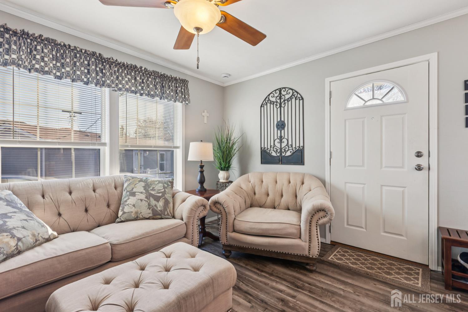 852 Highway 1, Unit X3 Edison, NJ 08817 - Photo 11 of 19 a living room with furniture and a large window
