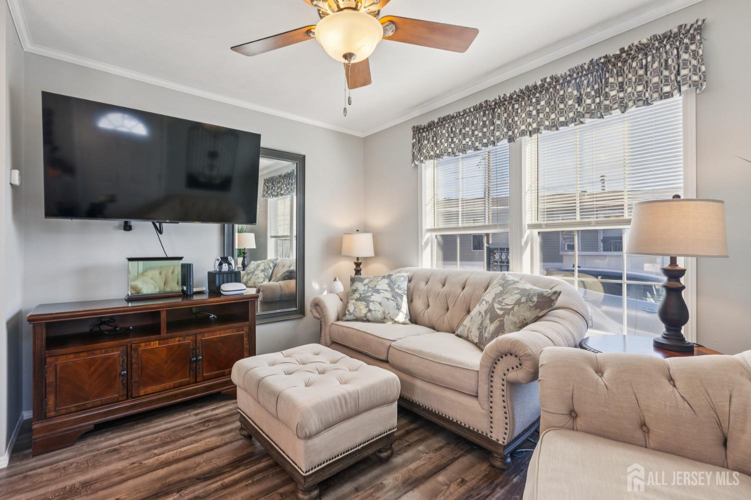 852 Highway 1, Unit X3 Edison, NJ 08817 - Photo 4 of 19 a living room with furniture and a flat screen tv