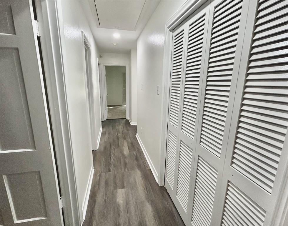 10010 Burgoyne Road Houston, TX 77042 - Photo 29 of 32 Hallway with access to closet, bedrooms and guest bathroom.