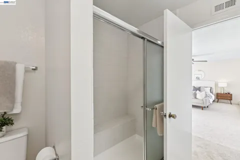 a bathroom with a shower curtain
