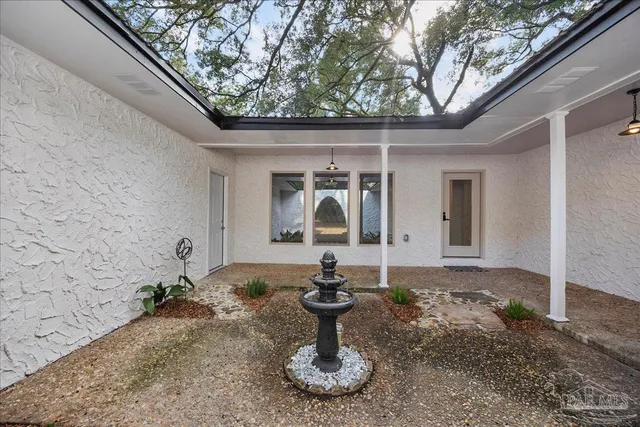 a bathroom with a sink and mirror