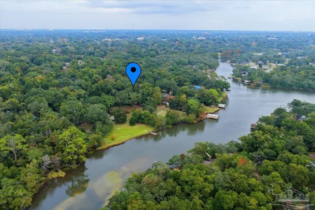 a view of a area with a street and trees