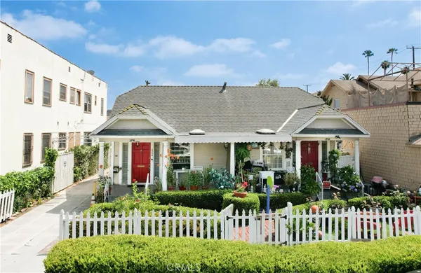 front view of a house with a small yard