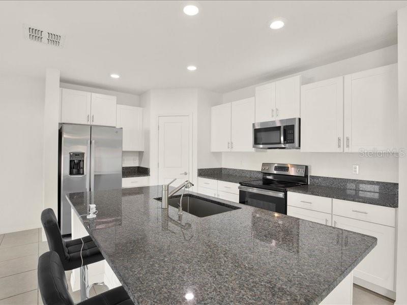 6213 Back Forty Loop Zephyrhills, FL 33541 - Photo 12 of 57