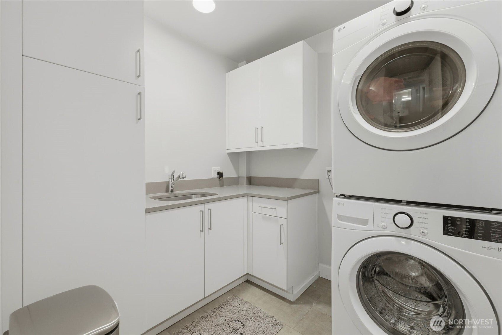 4907 Main Street, Unit 214 Tacoma, WA 98407 - Photo 20 of 34 a utility room with sink dryer and washer