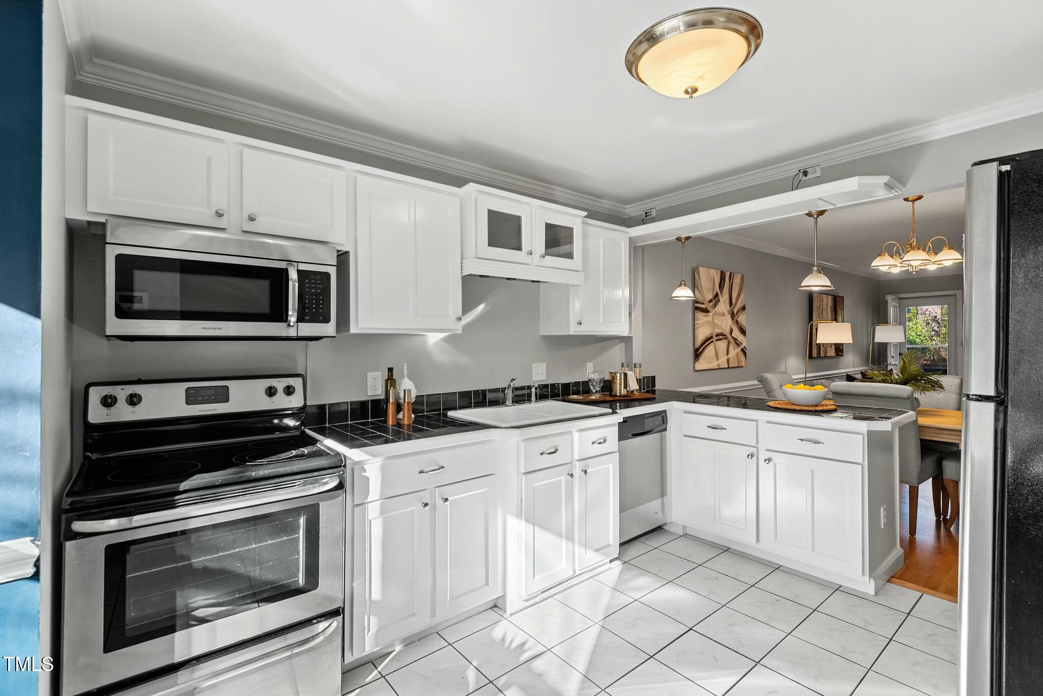 1402 Mahonia Court Raleigh, NC 27615 - Photo 6 of 39