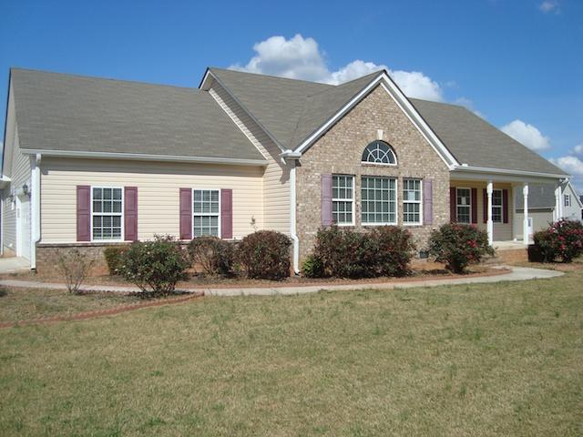 171 Old S River Road Jackson, GA 30233 - Photo 1 of 1 a front view of a house with a yard