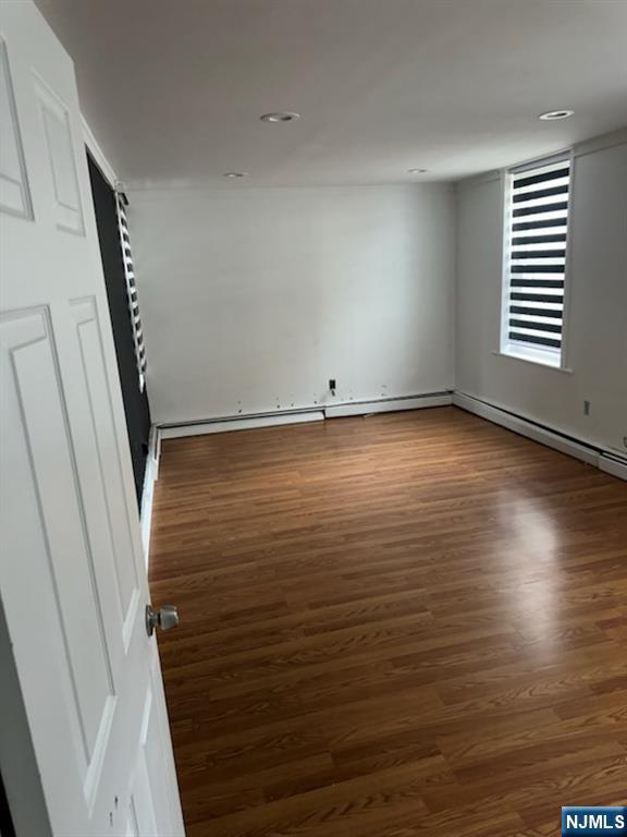 900 River Road, Unit 2A Edgewater, NJ 07020 - Photo 6 of 12 a view of a room with wooden floor and window