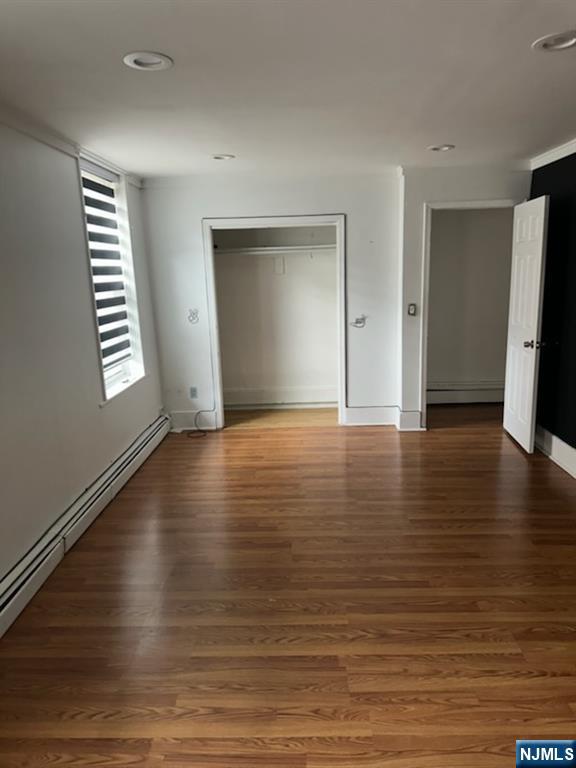 900 River Road, Unit 2A Edgewater, NJ 07020 - Photo 7 of 12 a view of empty room with wooden floor and window