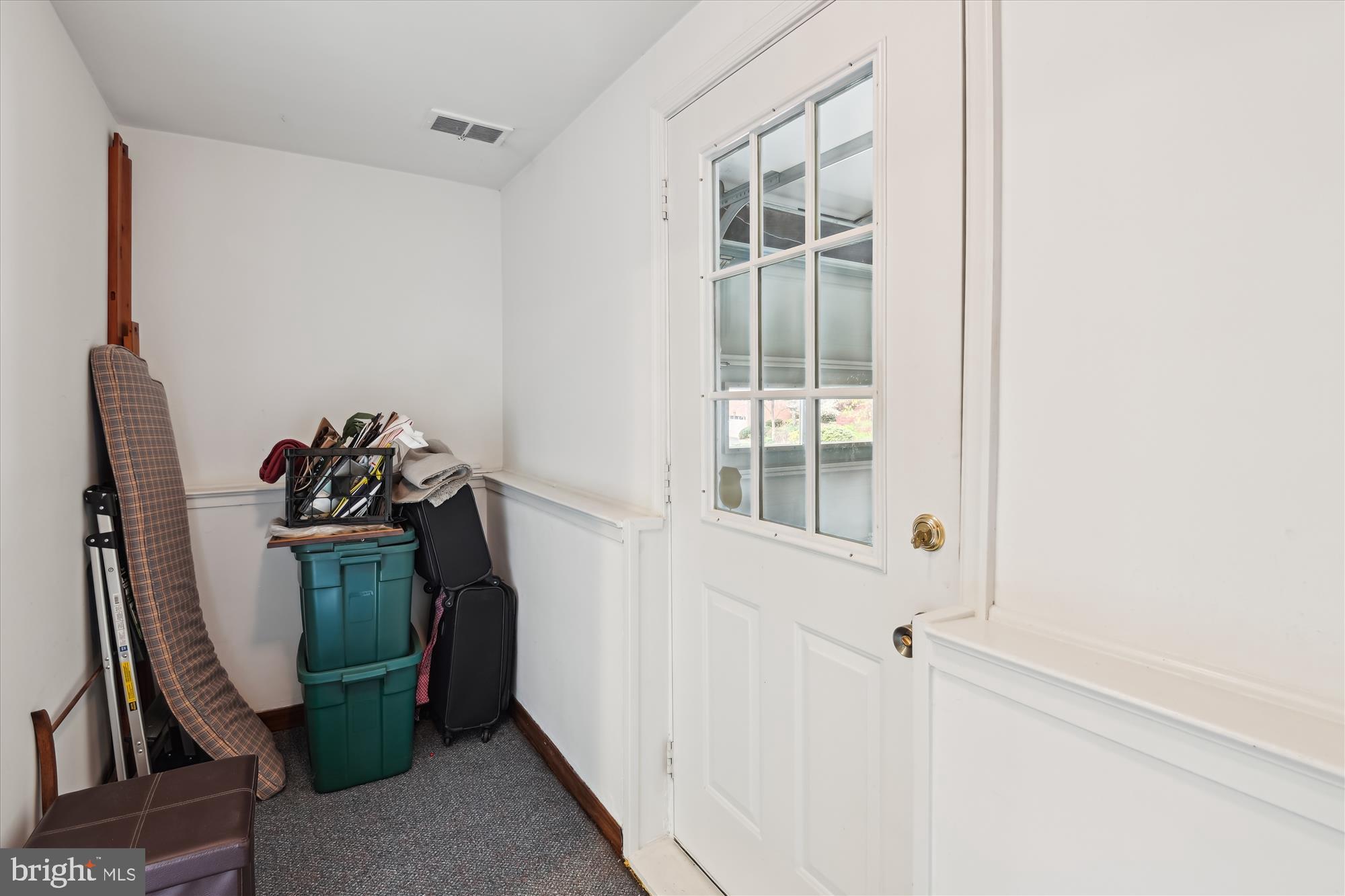 3701 Meadowvale Road Ellicott City, MD 21042 - Photo 54 of 73 CHAIR RAIL, CARPET FLOORING & DOOR TO GARAGE