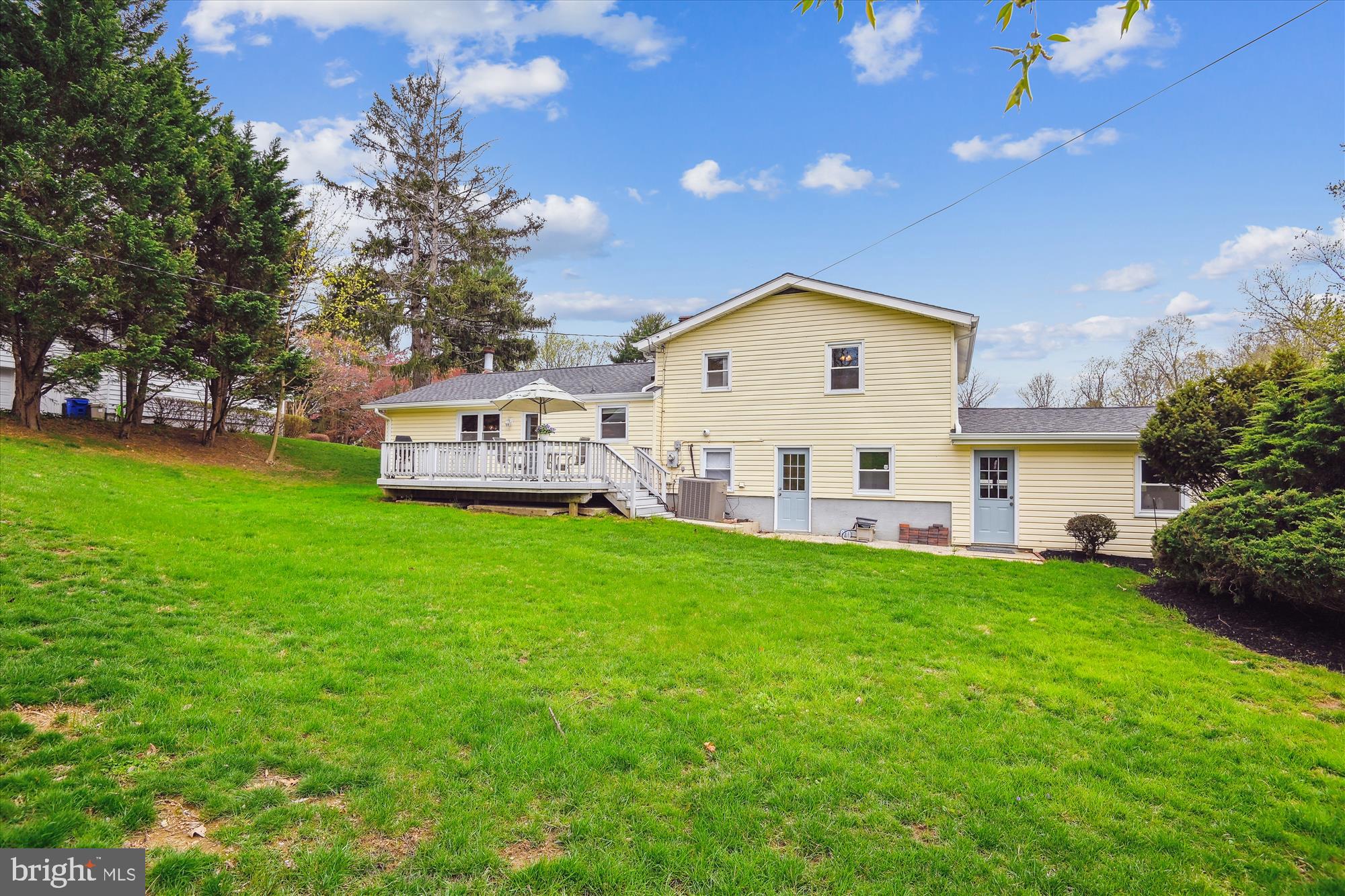 3701 Meadowvale Road Ellicott City, MD 21042 - Photo 66 of 73 a view of a house with a yard