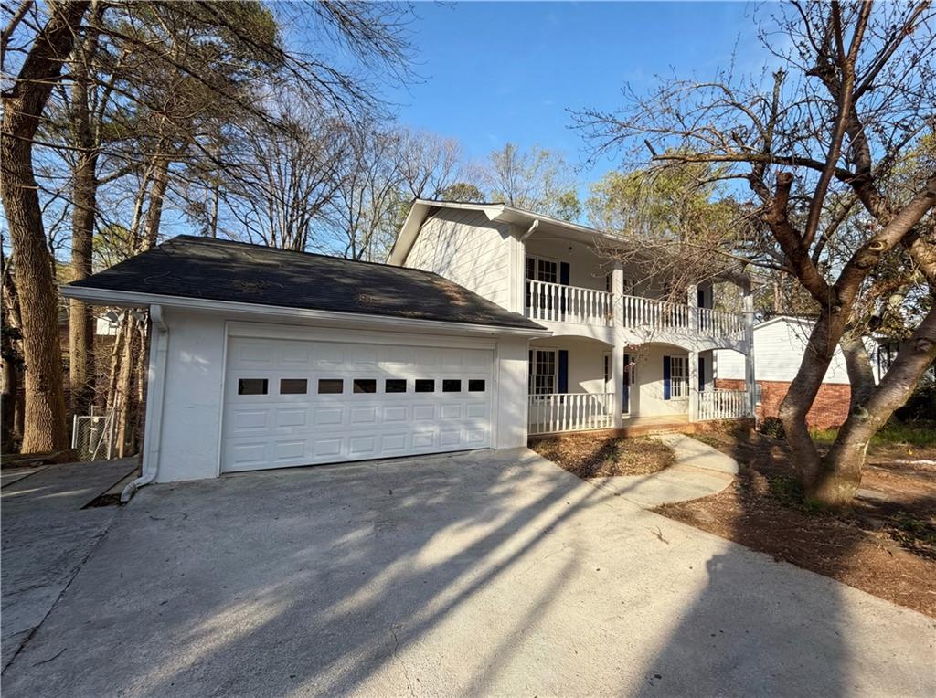 a view of a building with a yard