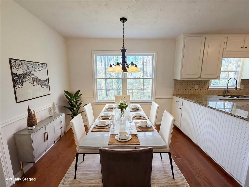 197 Rockbridge Road Southwest Lilburn, GA 30047 - Photo 5 of 27 a view of a dining room with furniture window and outside view